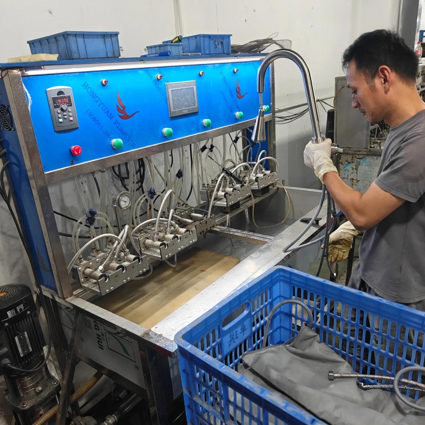 OTTUA faucet undergoing water pressure and leakage testing at the factory